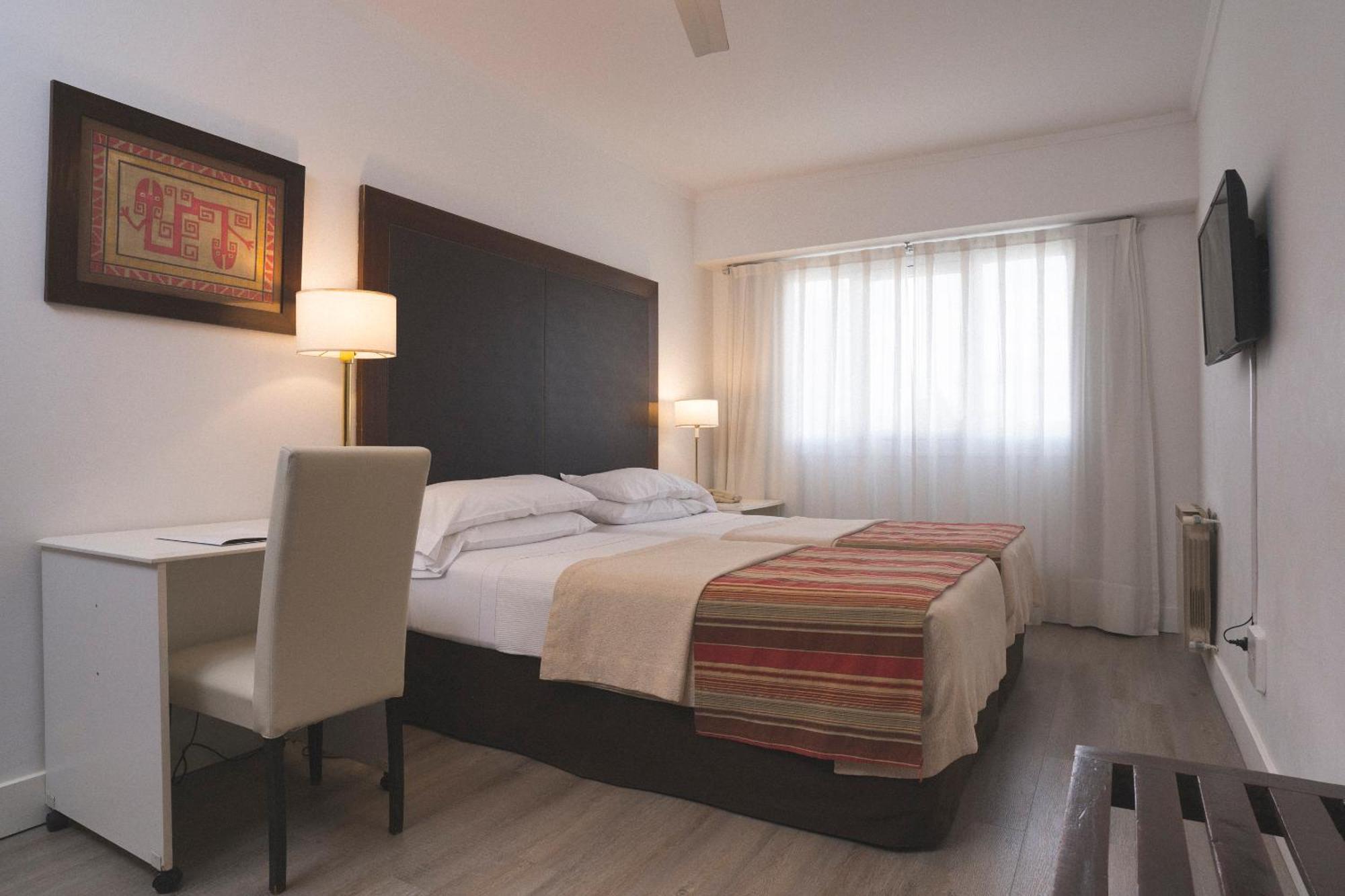 Hotel Tolosa Пуерто Мадрин Стая снимка