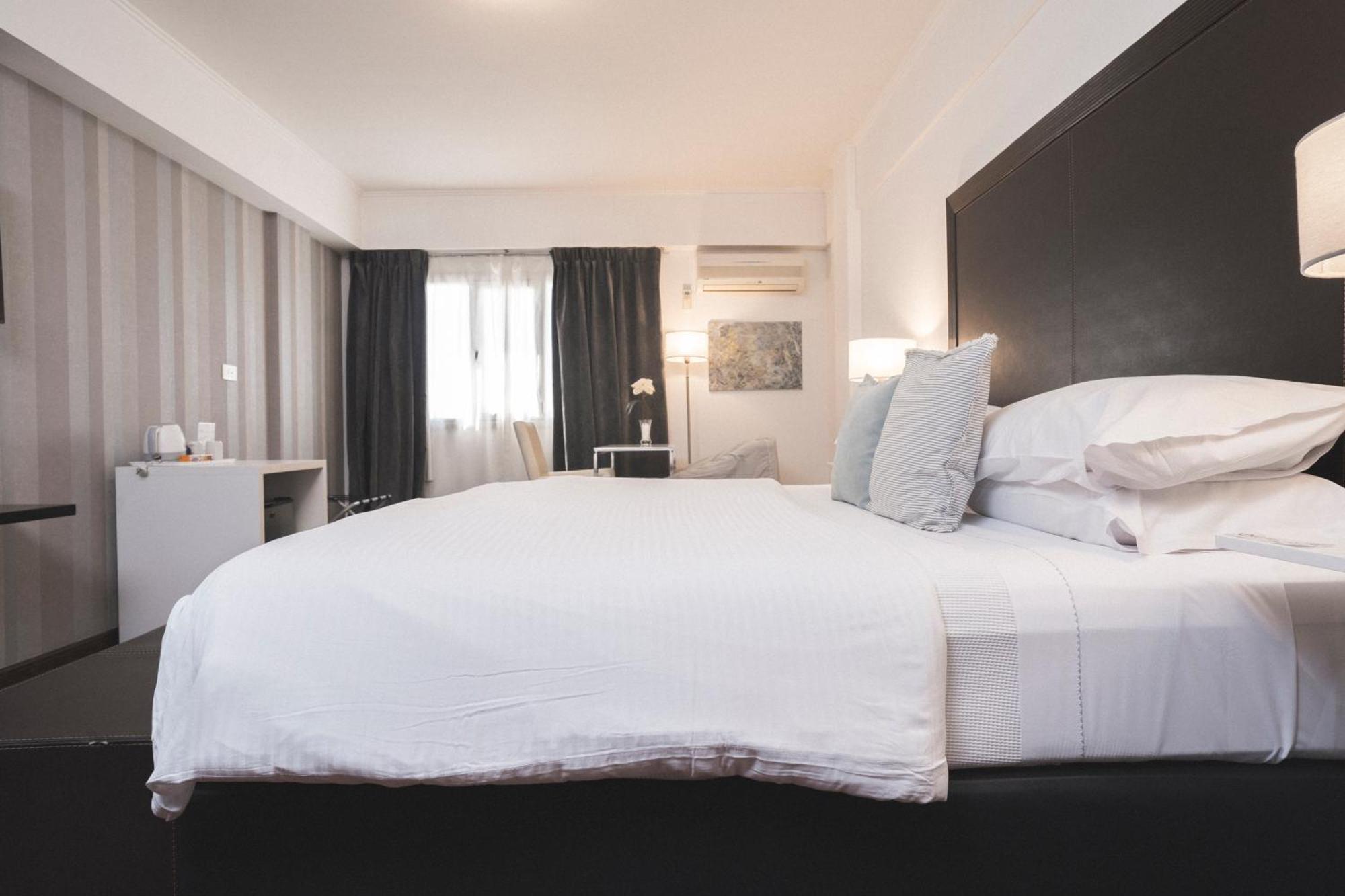 Hotel Tolosa Пуерто Мадрин Стая снимка